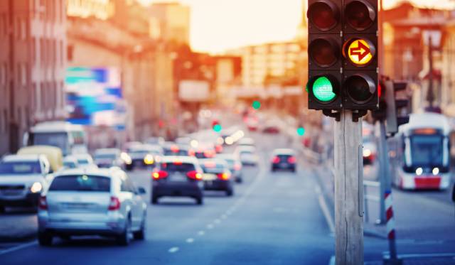 Cars in traffic with traffic lights