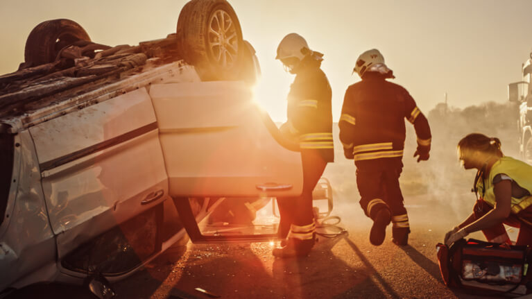 Paramedics at rollover accident