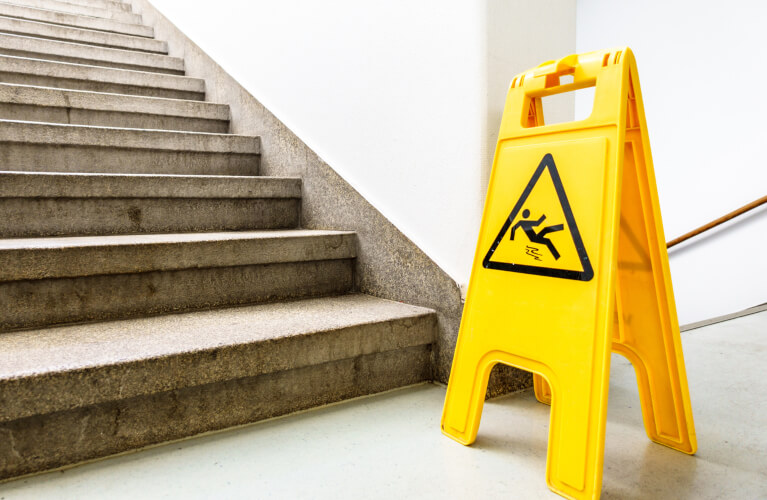 Slip and Fall Sign by Stairs