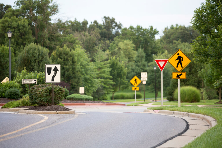 Yield sign on a winding highway